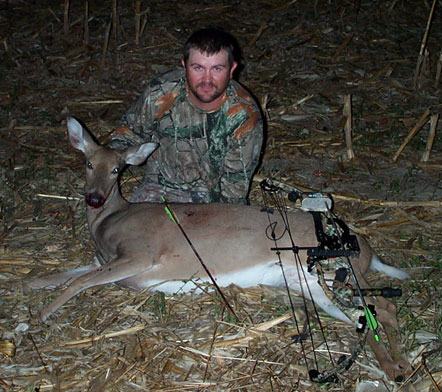 Dan Hudzik showcasing a whitetail dear called in with a FOXPRO game call